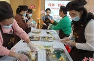 桂林市民欢聚一堂：共享桂花糕，品味桂花茶