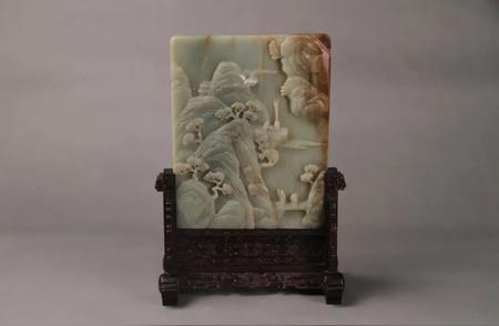 青玉浮雕炼丹图插屏：千年文物的魅力与价值